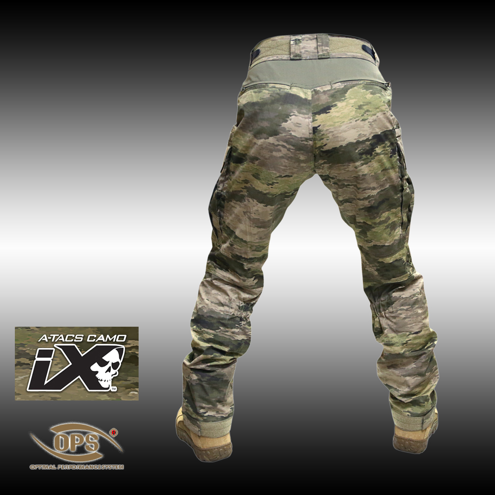 Rear view of O.P.S. Traverse Warrior Pants in A-TACS iX camo showing the upper back DuraStretch flexibility panel.
