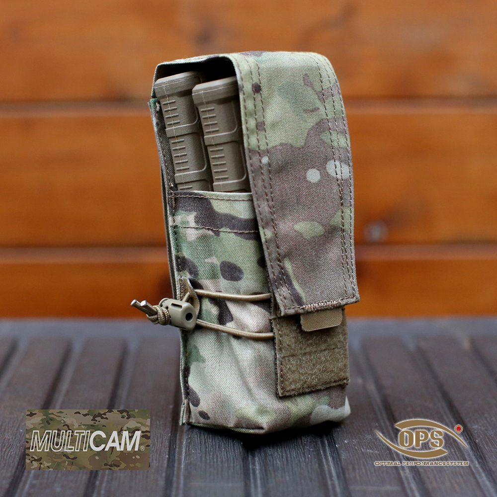 OPS Multi-Cal Mag Pouch holding two 5.56 rifle magazines with adjustable elastic retention